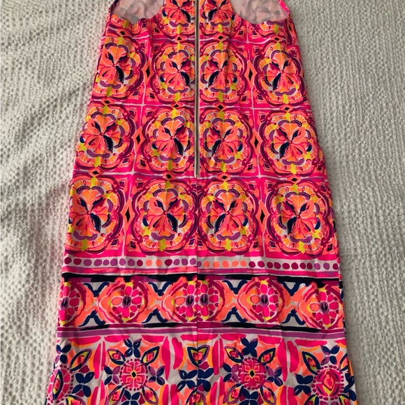 Lilly Pulitzer dress size 2 has some stretch and very flattering on. - Picture 2 of 3